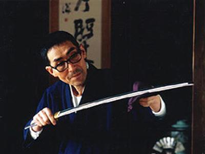 天田 昭次